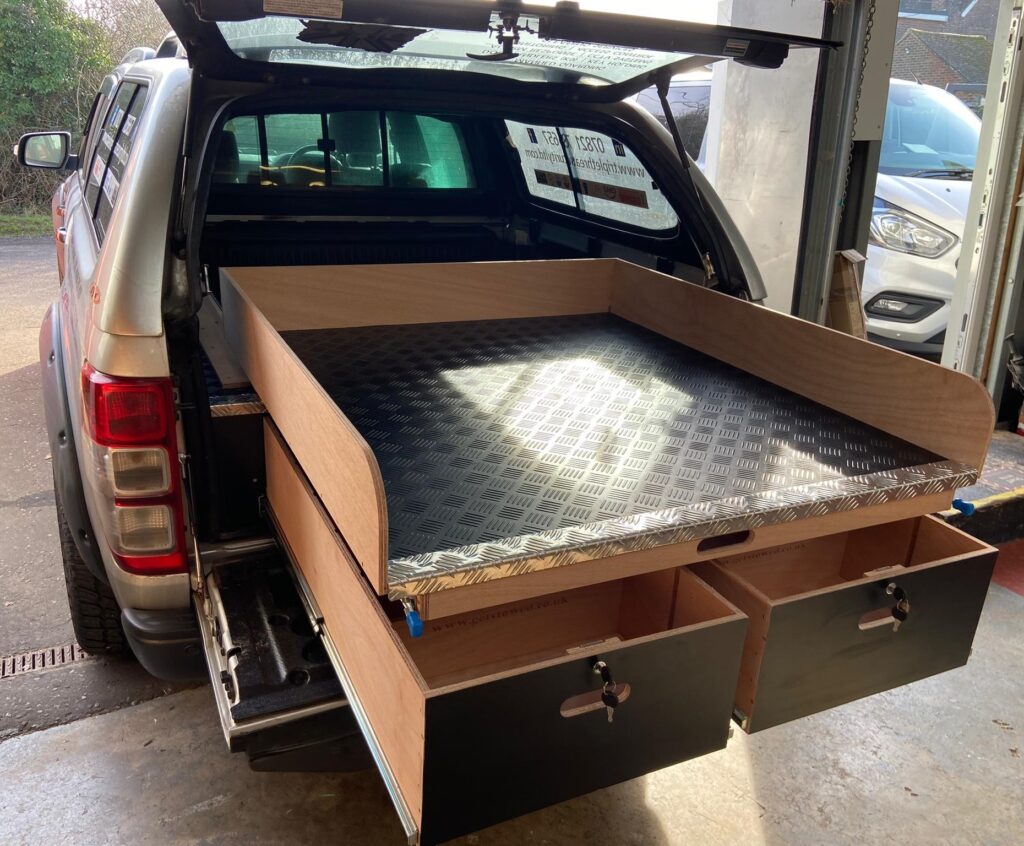 Slide-out trays for van storage